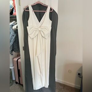 Ivory satin low back jumpsuit with detachable bow